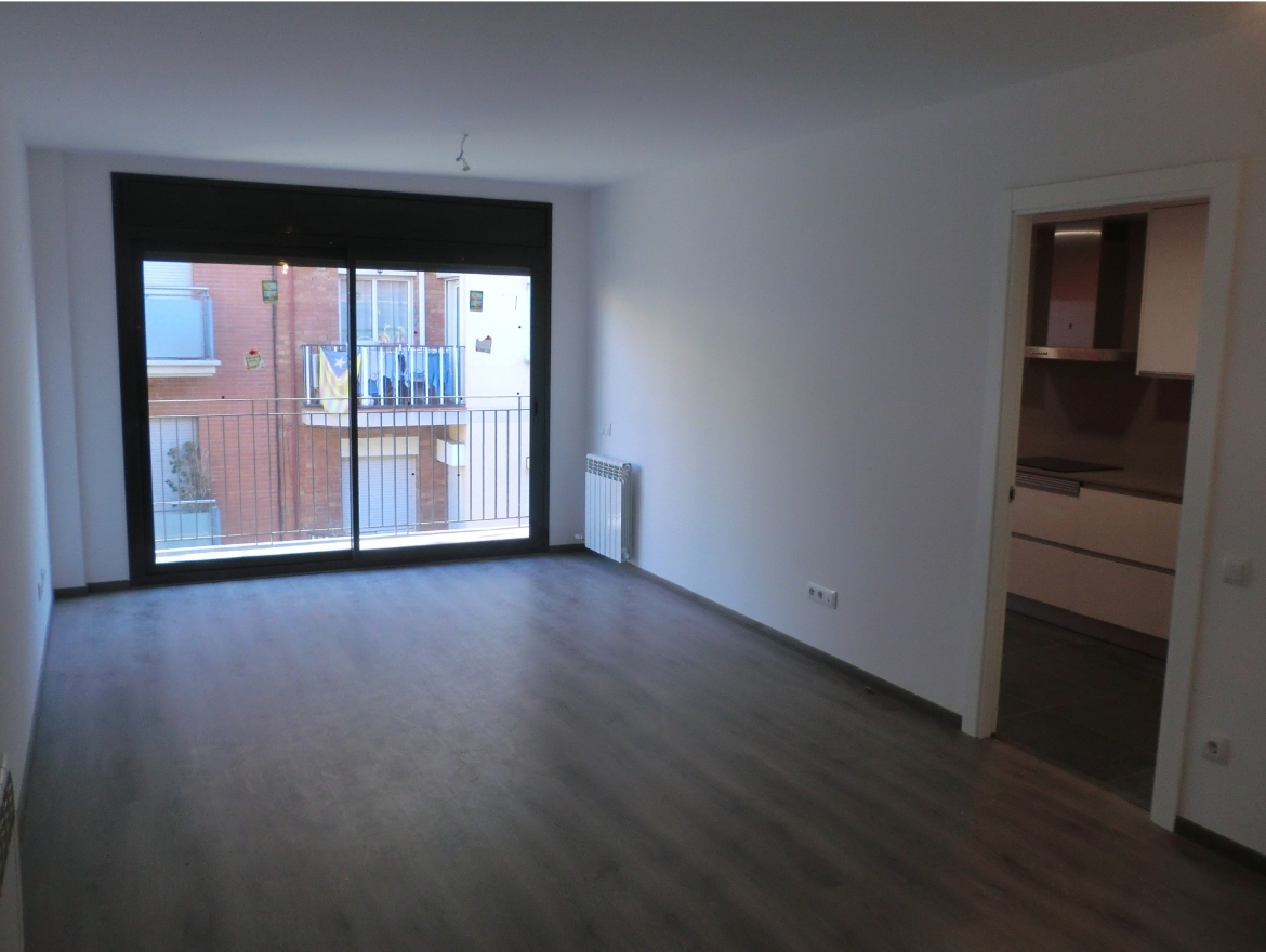 Oriol Pujol Mata, arquitecte. Edifici plurifamiliar de 7 habitatges i aparcament Rambla Muntanya