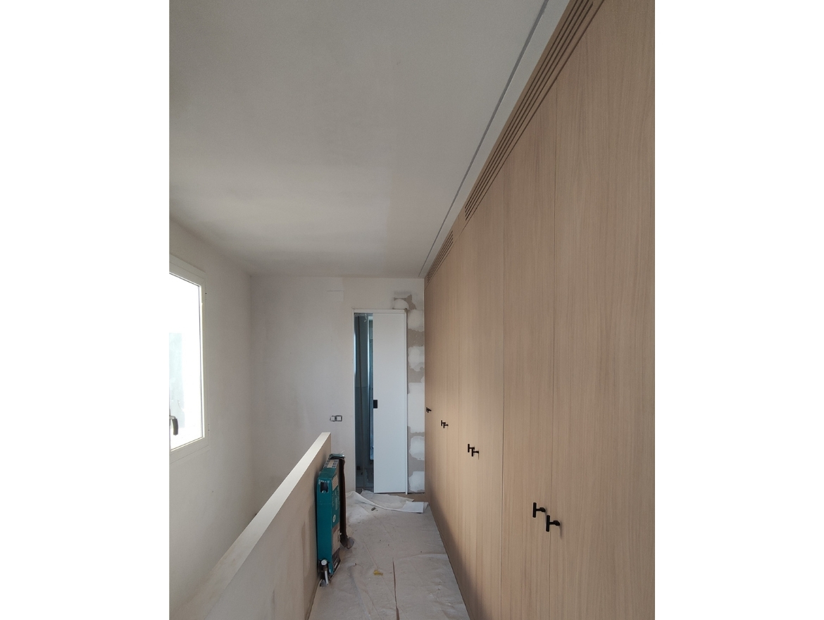 Oriol Pujol Mata, arquitecte. Reforma interior 4 habitatges i reconversió en dos