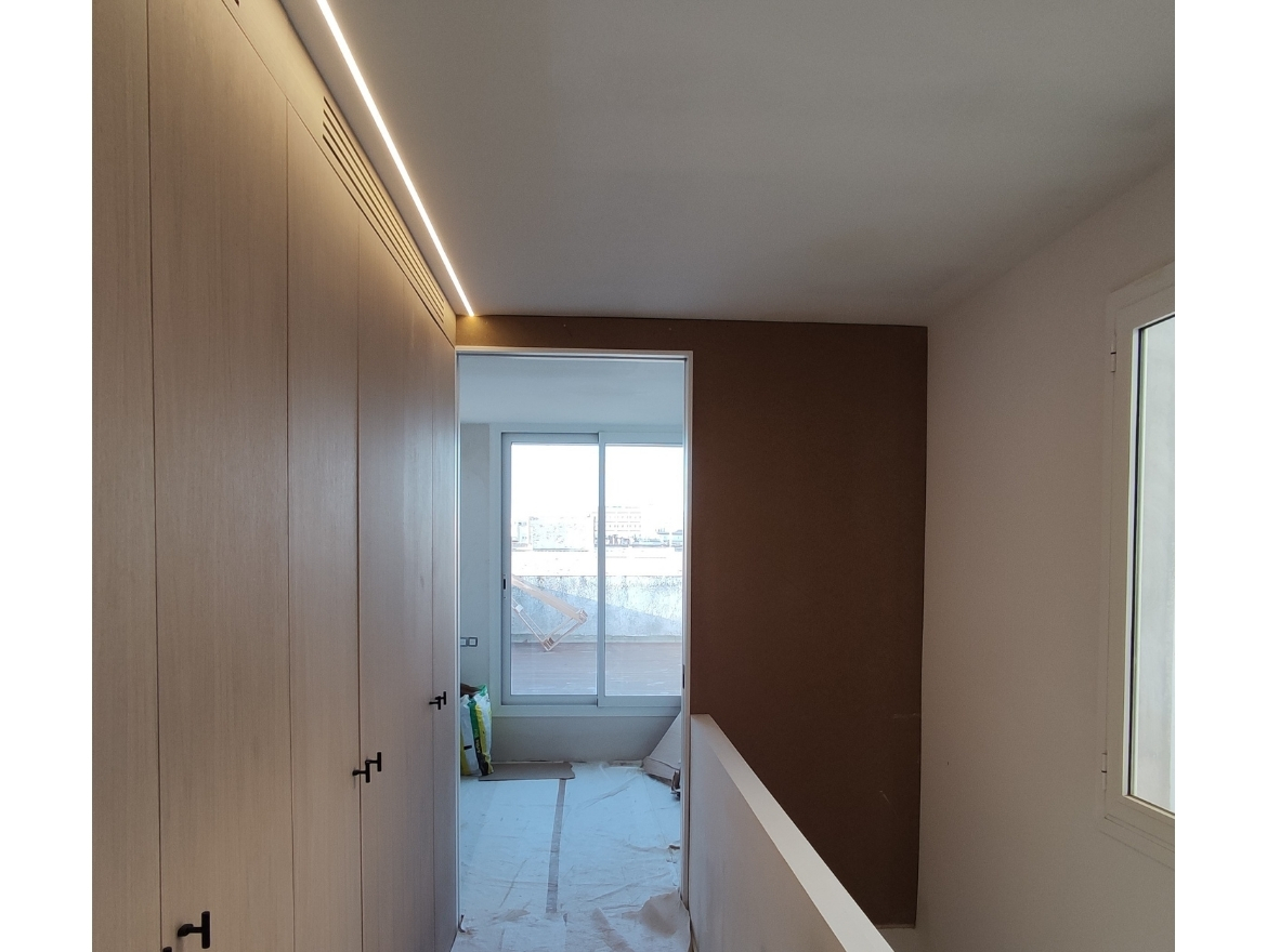 Oriol Pujol Mata, arquitecte. Reforma interior 4 habitatges i reconversió en dos